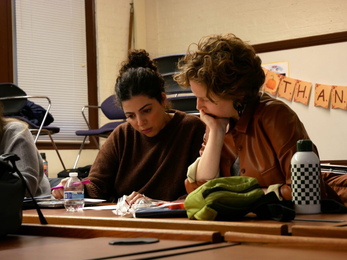 Two Chicago Public Schools school leaders analyze their school's advanced course enrollment data in a review of Equal Opportunity Schools' survey data.